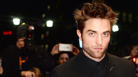 Robert Pattinson at a red carpet event.