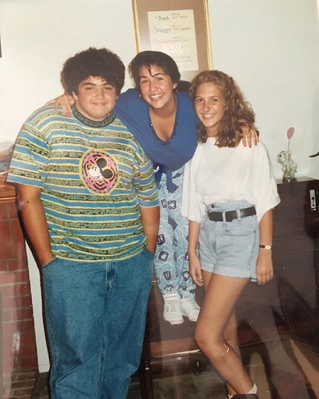 Young Jorge at 16 years old (left) with Coleen (right) and another woman with her arms around both of them (center).