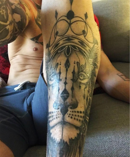 Left Shin Lion tattoo