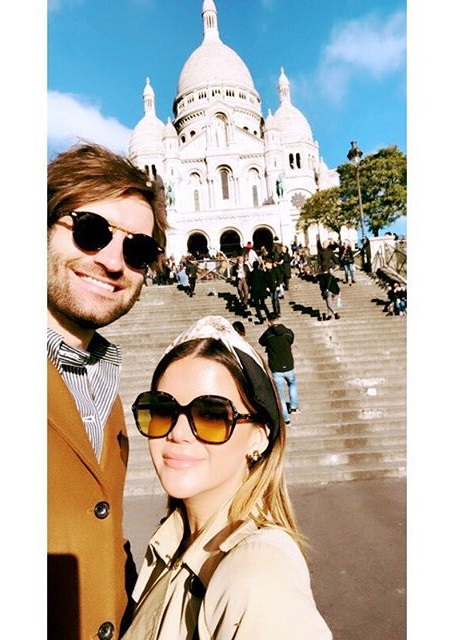 Maren Morris clicking the selfie with Ryan in front of a chapel in Paris, France.