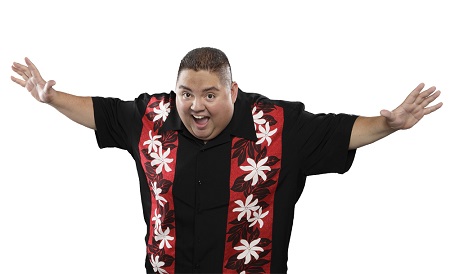 Beardless Gabriel Iglesias in his Hawaiian shirt spreading his arms out with his mouth open in excitement. As a Pose.