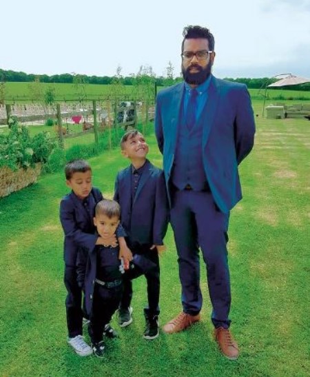 Romesh with three sons