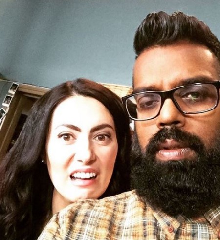 Romesh and Leesa making weird faces for the camera.