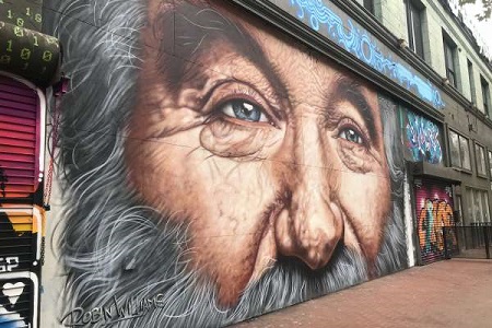 The mural of Robin Williams on a wall before it was taken down.