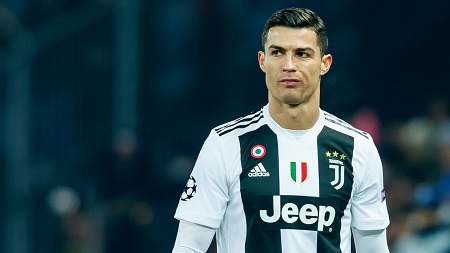 Cristiano Ronaldo in his Juventus kit during a champions league match.