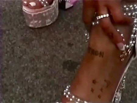 Ariana Grande's foot revealing  Myrion word from the side. (foot only)