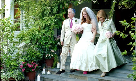 LOS ANGELES, JUNE 27, 2009. The bride with Henry and Stacey Winkler in the back garden of the Winkler home. Zoe's Wedding day.