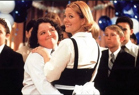 Young chubby Jimmy dancing with Drew Barrymore.