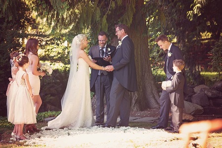 The moment of saying I Do's during Josie Bissett's wedding with Thomas Doig.