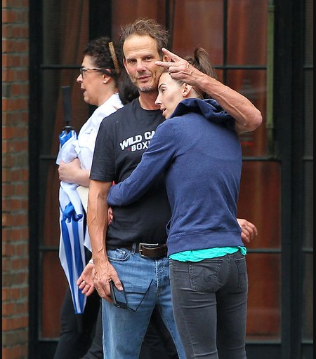 Peter Berg and Whitney Cummings hugging.