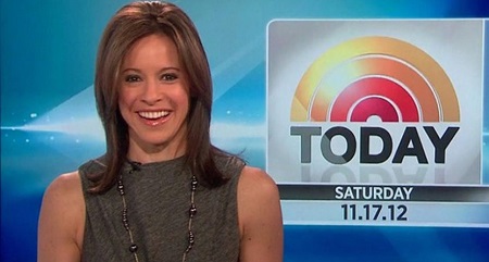 Jenna smiling at the camera on the set of NBC Today show with the logo at the background.