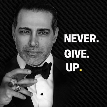 Manny Khoshbin, with a net worth of $80 million, holding a cigar with 'Never Give Up' written beside his headshot in a suit.