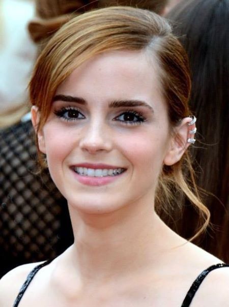 Emma Watson is more than happy to be single.