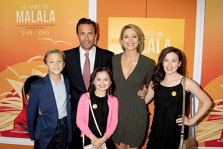 Andrew Shue and Amy Robach with two daughters and a son at an event for 'He Named Me Malala' (2015)