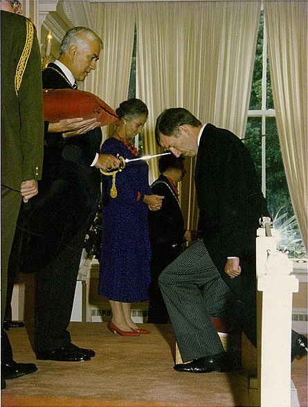 Ron Brierley being knighted by Sir Paul Reeves in 1988.
