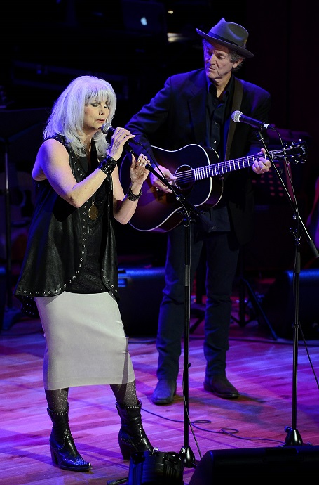 Emmylou Harris and ex-husband Paul Kinnerly on stage during a performance.