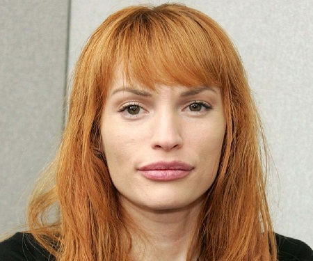 Jolene Blalock headshot showing possible plastic surgery on lips.