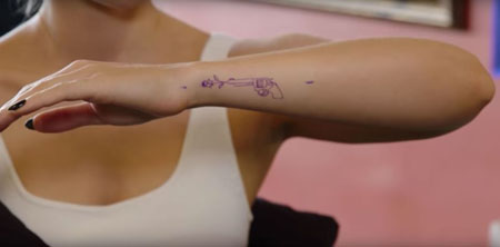 Cameron Boyce got gun and rose tattoo on her arm in honor of Cameron Boyce.