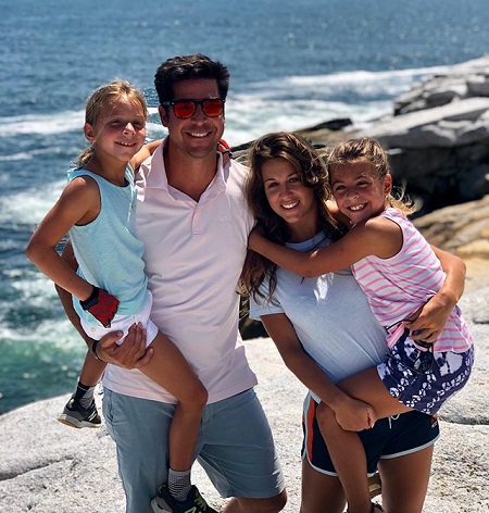 Jesse Watters and Emma DiGiovine with his daughters Ellie and Sophie at the rocky seaside.