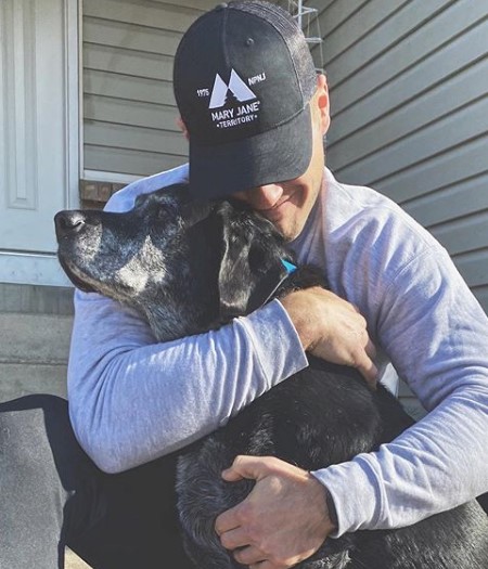 Colton Underwood with his dog, Sniper.
