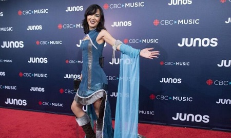 In this March 25, 2018, file photo, Kelly Fraser arrives on the red carpet at the Juno Awards in Vancouver, British Columbia.