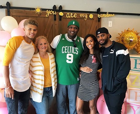 Kendra Bailey and Bryson Tiller with her friends at the baby shower.