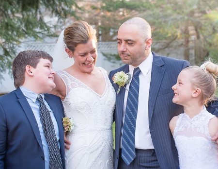 Sarah on her wedding day with husband Sean and her two kids, Maxwell, and Cece.