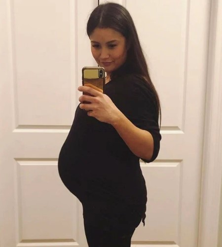Pregnant Catherine Giudici takes a selfie.