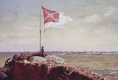A confederate flag flies high as a soldier stands underneath it.