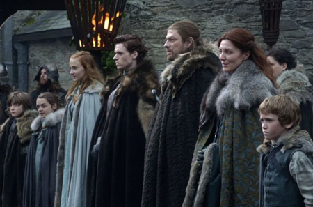 The whole Stark family welcome the king.