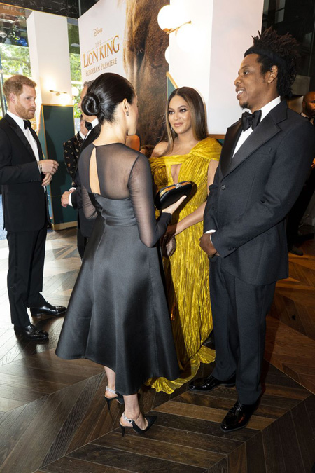 Beyonce and Jay-Z talk to Meghan Markle.