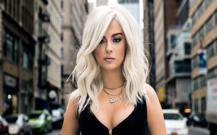 Bebe Rexha Reveals The Secret To Her Bleach Blond Hair And Keeping
