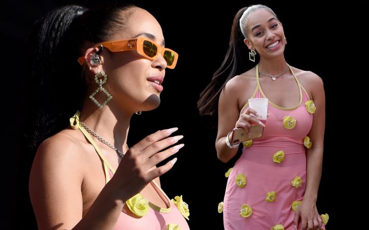 Jorja Smith Cuts A Stylish Figure Taking To The Made In America Festival Stage In A Pink Mini-Dress With Bright Green Floral Embellishments