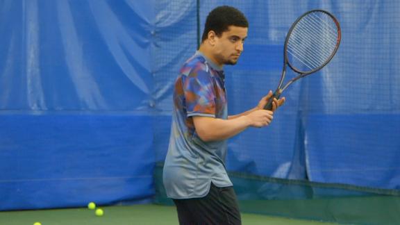 Robert De Niro's son Elliot De Niro is playing tennis.