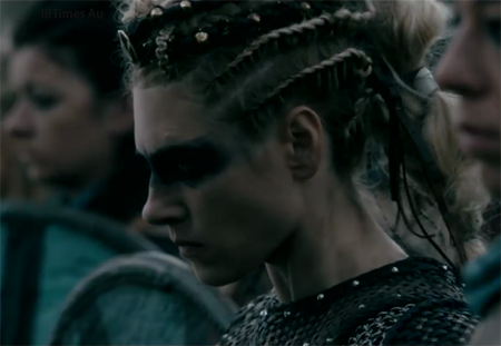 Katheryne Winnick in Vikings with war paint and ready for war.