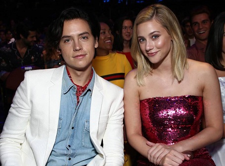 Cole Sprouse and Lili Reinhart attending an event