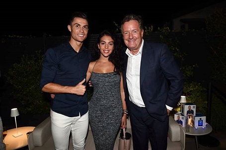 Georgina Rodriguez 's caption while standing between Ronaldo and Morgan: "I admired you before. Now I admire you more. A pleasure to share thoughts with great people. Thanks for everything. 👑✨💥 @piersmorgan @cristiano"