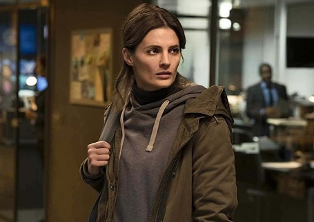 Stana Katic on the show 'Absentia' wearing a hoodie and a jacket.