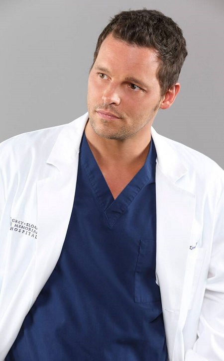 Justin Chambers in his doctor suit from 'Grey's Anatomy' posing.