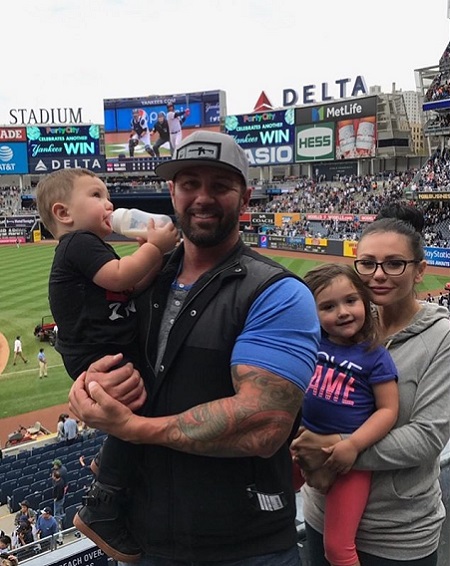 This from the most recent post of Mathews on Instagram together with Farley and the kids during a football game.