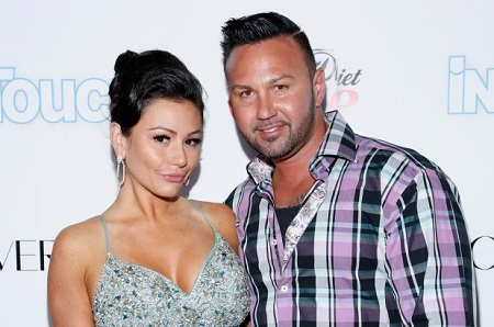 Roger Mathews and ex-wife Jenni "JWoww" Farley posing during an InTouchWeekly event.