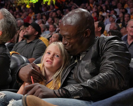 Seal (R) and his daughter Helene Samuel attend the game between the Dallas Mavericks and the Los Angeles Lakers at Staples Center on May 2, 2011 in Los Angeles, California.
