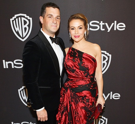 Dave Bugliari and Alyssa Milano attend the InStyle and Warner Bros. 76th Annual Golden Globe Awards Post-Party at The Beverly Hilton Hotel on January 6, 2019.