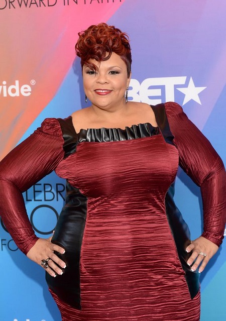 Tamela Mann at the BET awards in a stunning red dress.