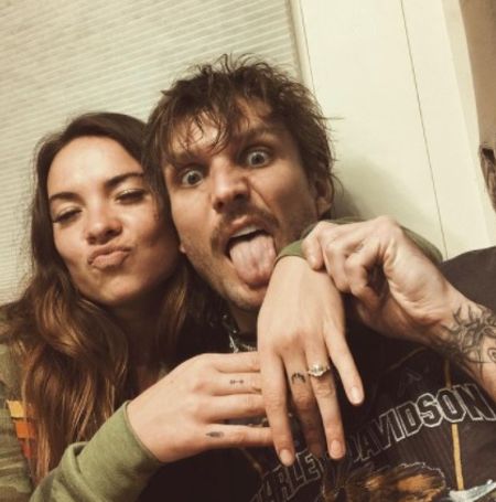 After dating for a year and a half, the musical artist Naomi Cooke and Martin Johnson are engaged.