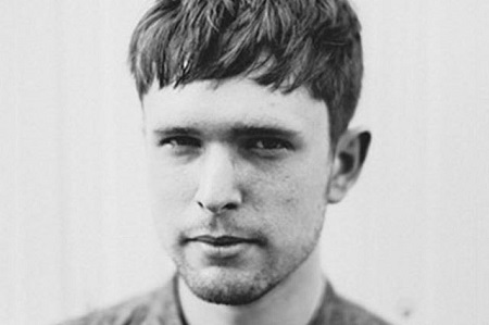 James Blake's black and white photo.