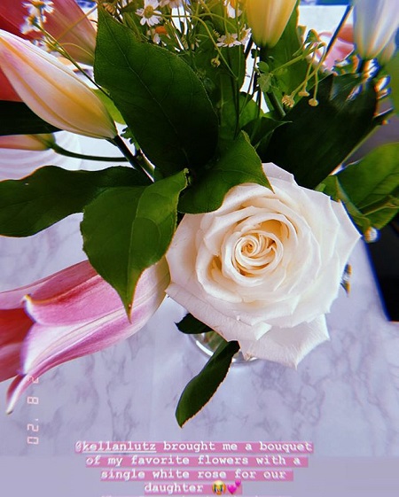 A single white rose from her husband, Kellan Lutz.