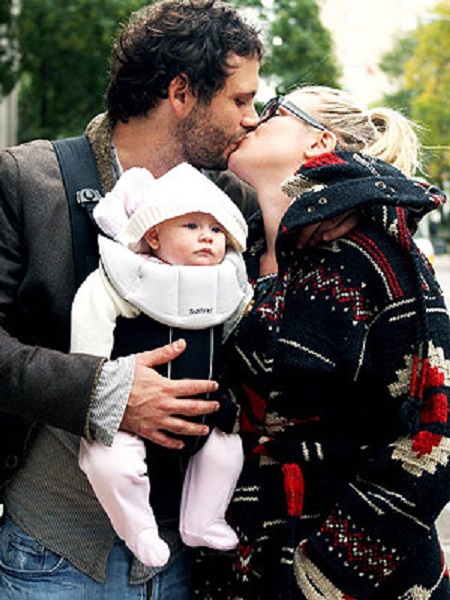 Jeremy Sisto was kissing his wife, Addie Lane, while holding their daughter in a carry-on.