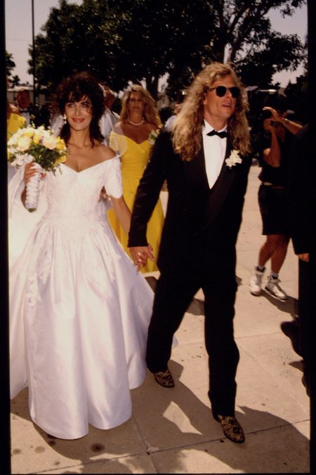 Marina Sirtis and Michael Lamper in their wedding dresses.