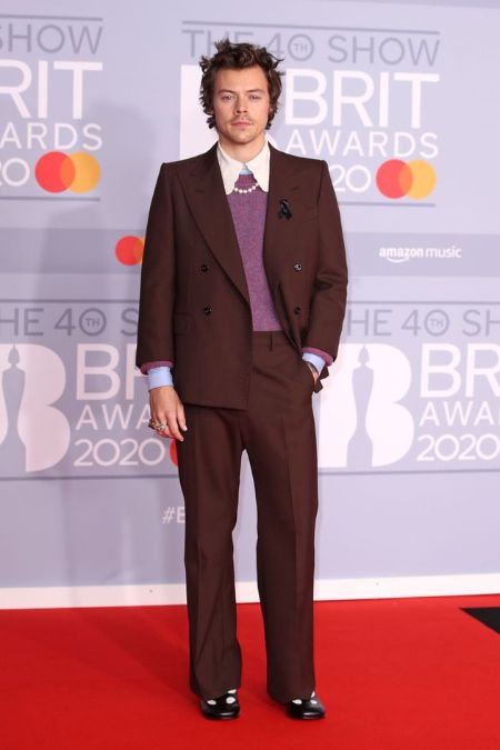 Harry Style posing at Brit Awards.